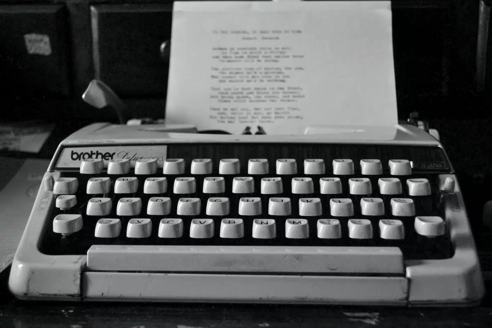 Photo by jules a. grayscale photography of Brother typewriter